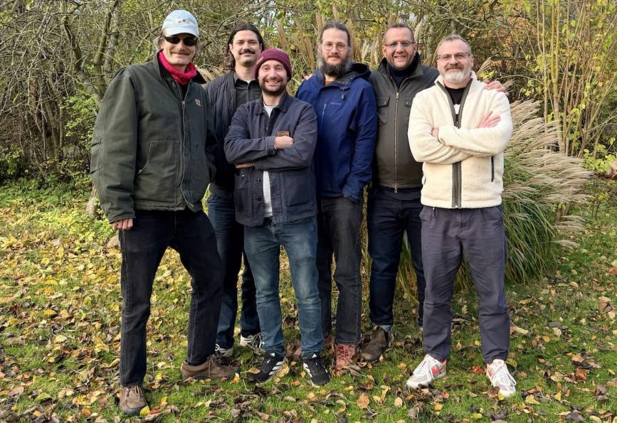 Photo de groupe d'Efterklang et de Flow Creative avec le World Mosquito Program